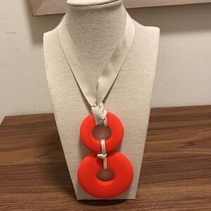 Vintage Mod Double Orange Circular Drop Necklace on Ribbon.